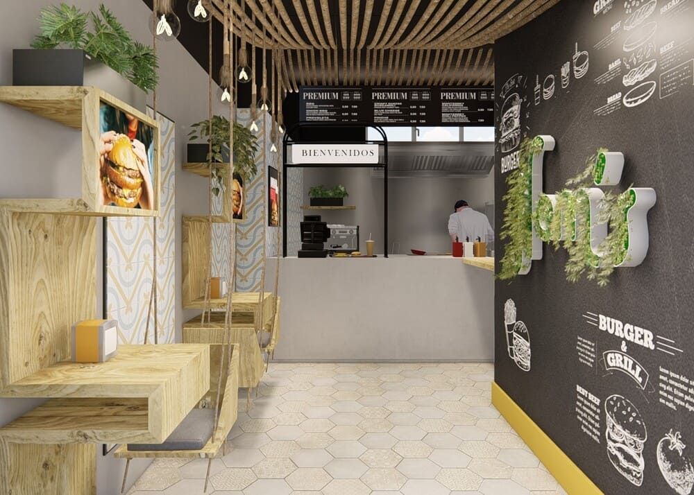 Impresión artística de un restaurante de hamburguesas con una pared de pizarra.