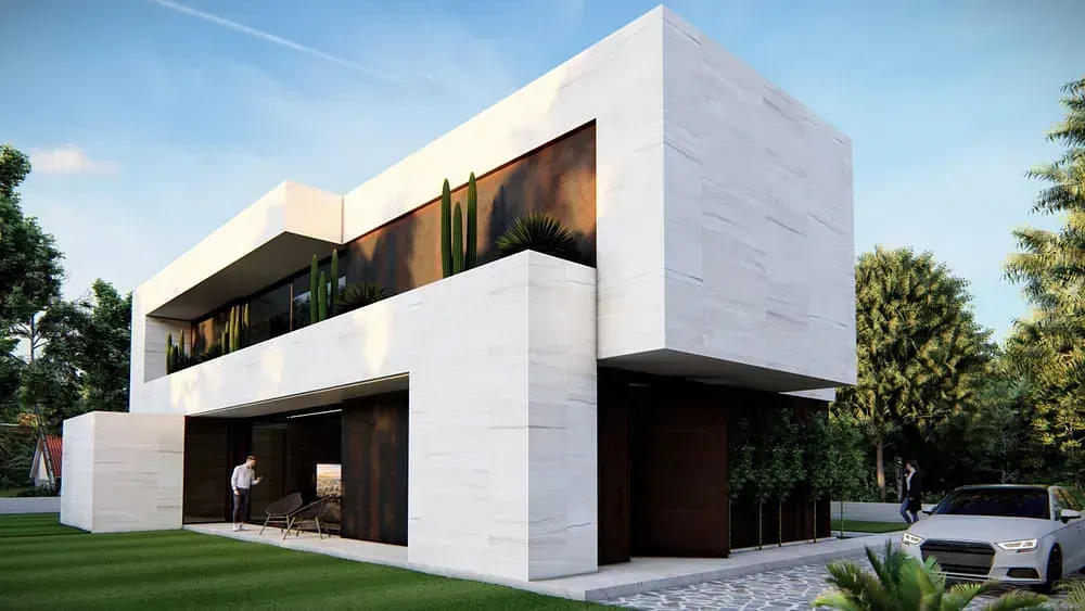 Una casa moderna con un coche aparcado delante de ella.