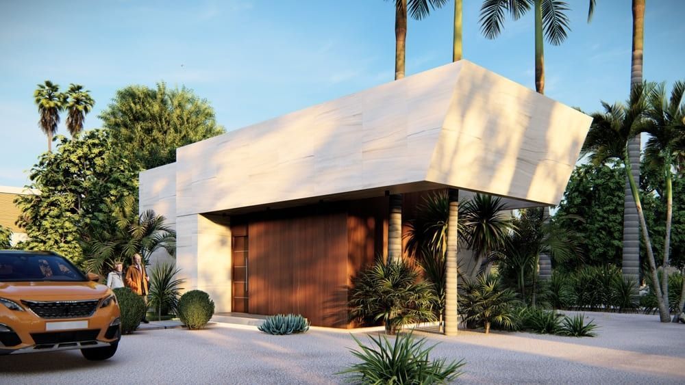Un coche está aparcado delante de una pequeña casa rodeada de palmeras.