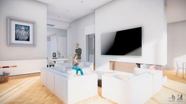 Sala de estar moderna y luminosa con sofás blancos, televisor montado en la pared, obras de arte y una persona de pie cerca de la cocina.