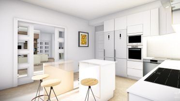 Cocina moderna y luminosa de color blanco con isla, taburetes, electrodomésticos integrados y una zona de estar abierta al exterior.