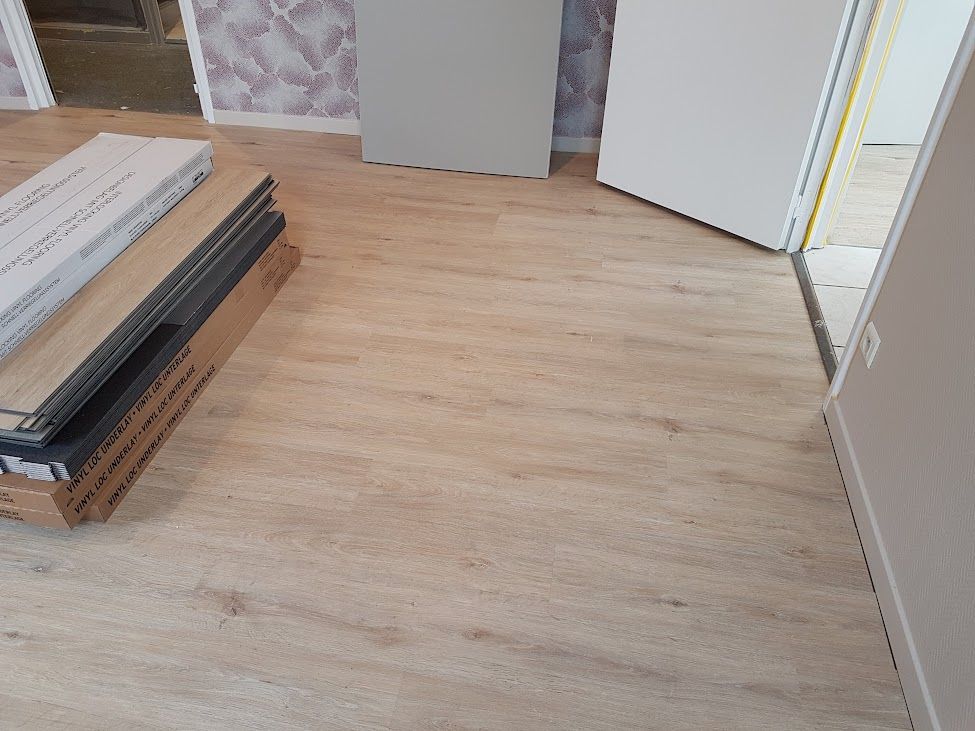 La pose d'un parquet.