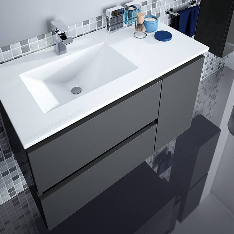 Un tocador de baño con lavabo y cajones.