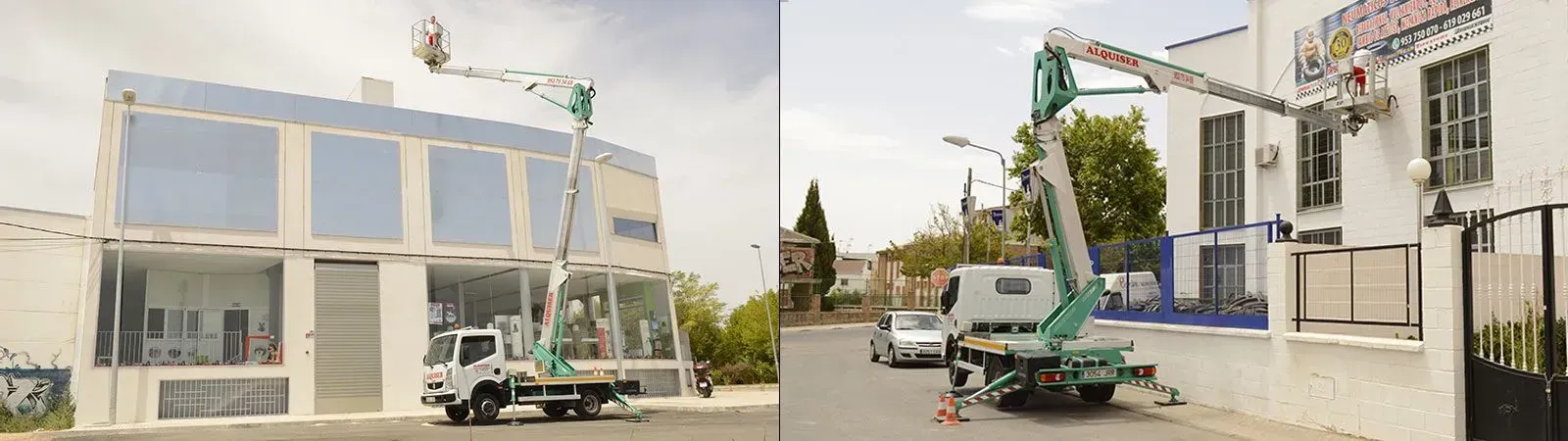 Un camión con una grúa en la parte trasera está estacionado frente a un edificio.