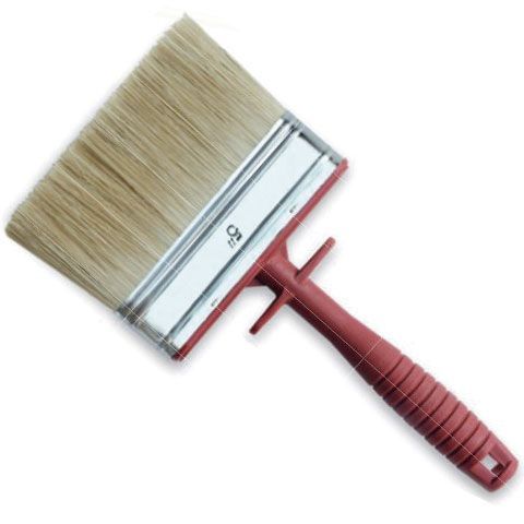 Un pincel con mango rojo y cerdas blancas