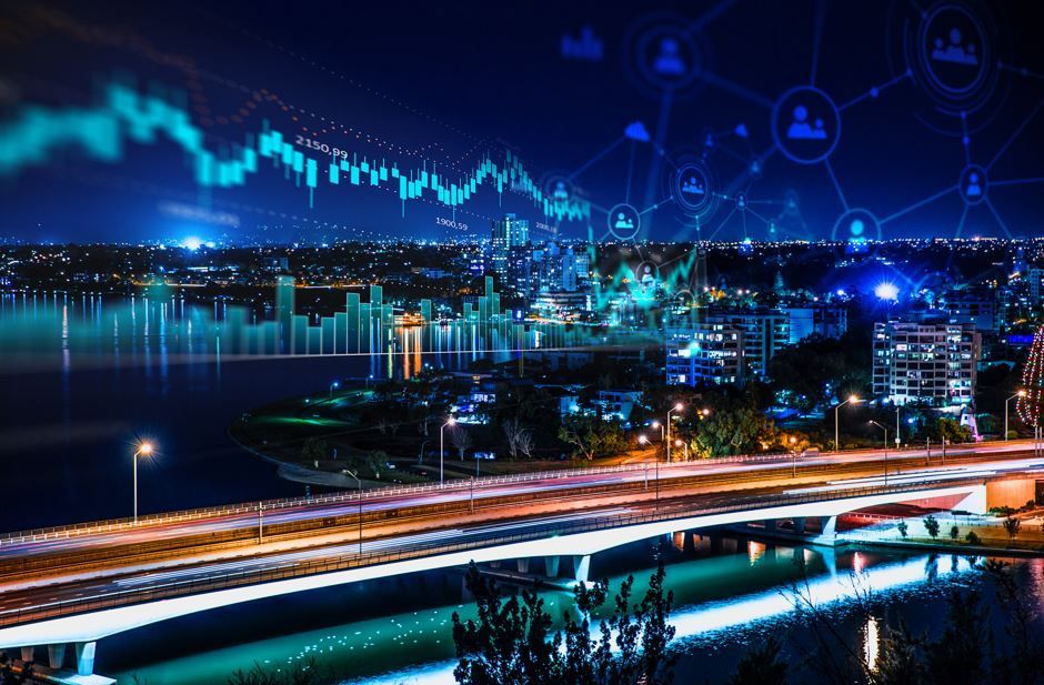 Horizonte de la ciudad por la noche con gráficos