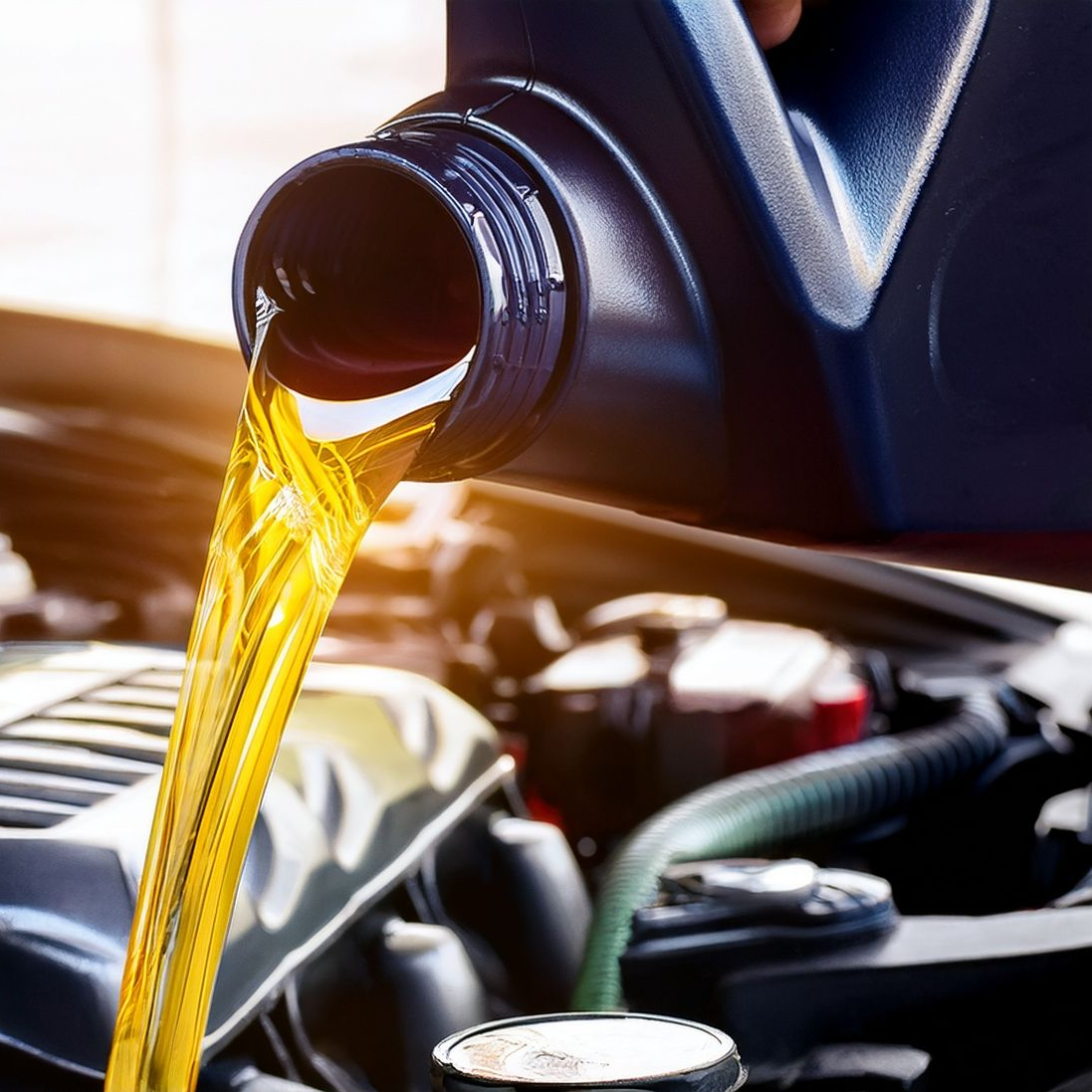 Huile moteur versée dans le moteur