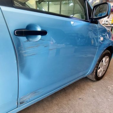 réparation de porte et peinture