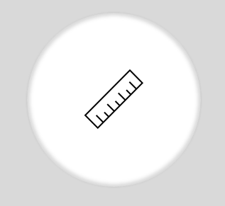 Un icono de regla en un círculo blanco sobre un fondo gris.