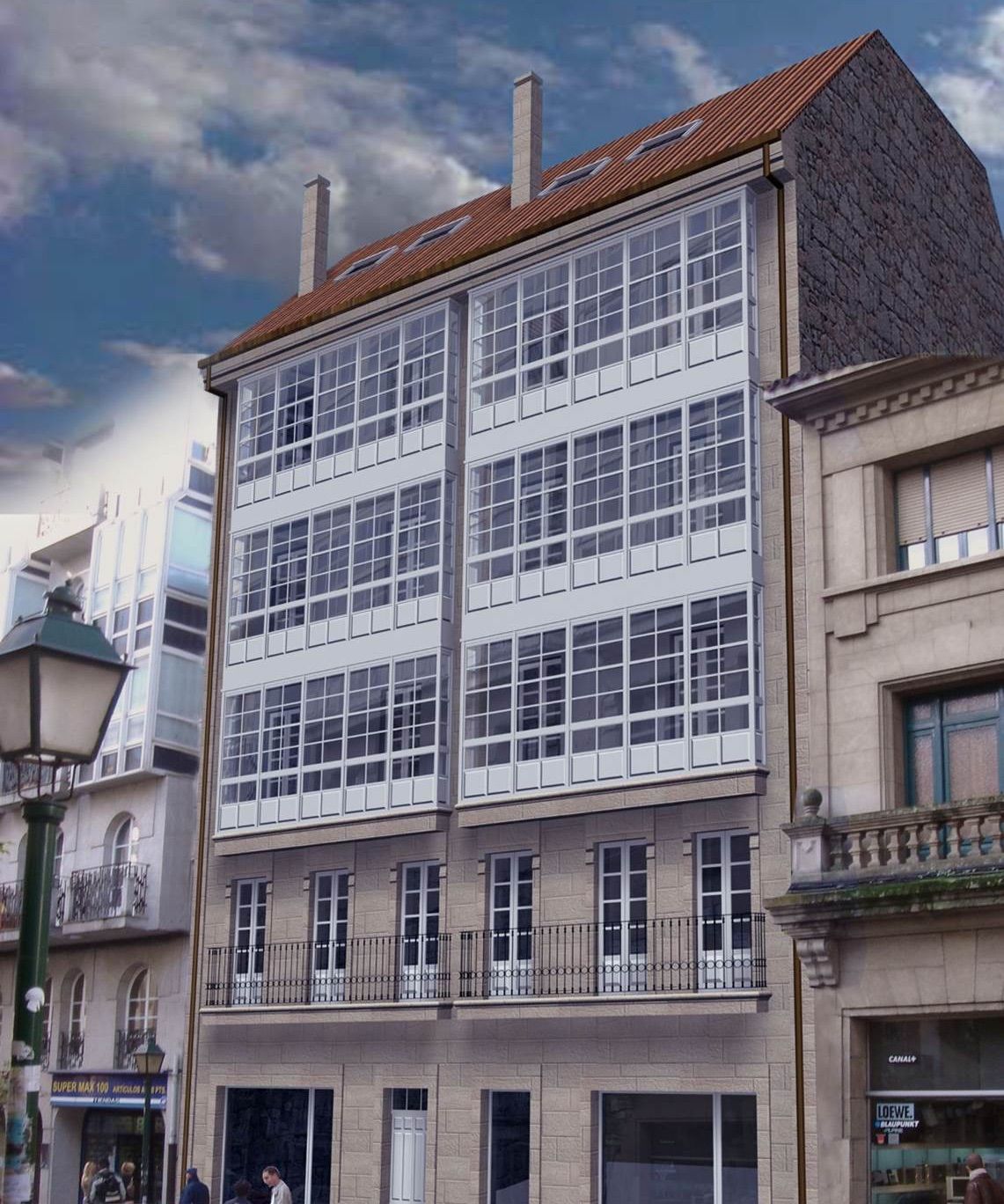 Un edificio grande con muchas ventanas y balcones.