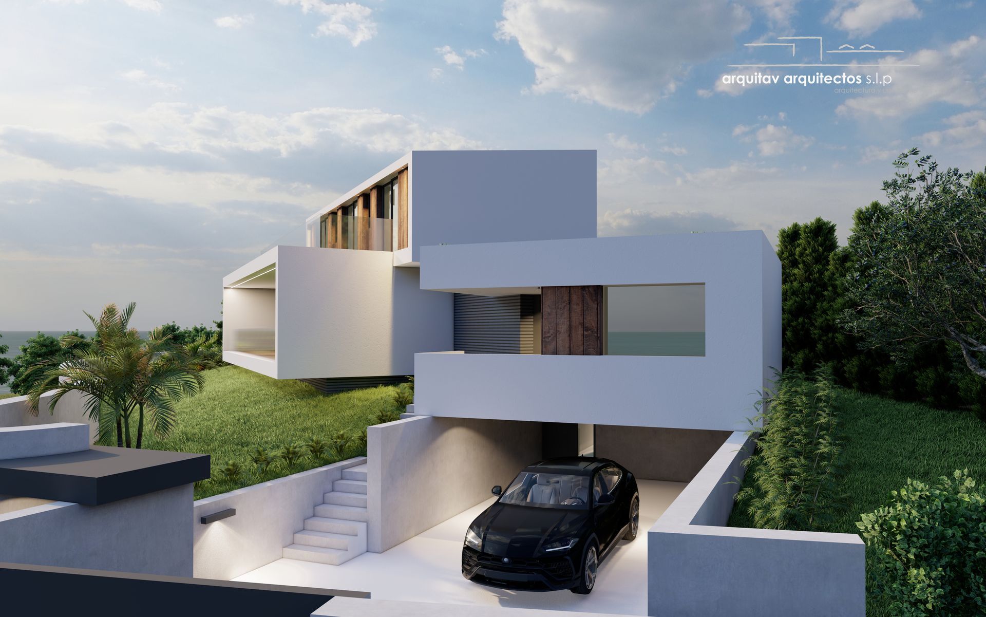 Un coche está aparcado en la entrada de una casa moderna.