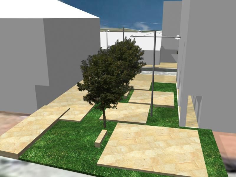 Una vista aérea de un parque con un árbol en el medio.