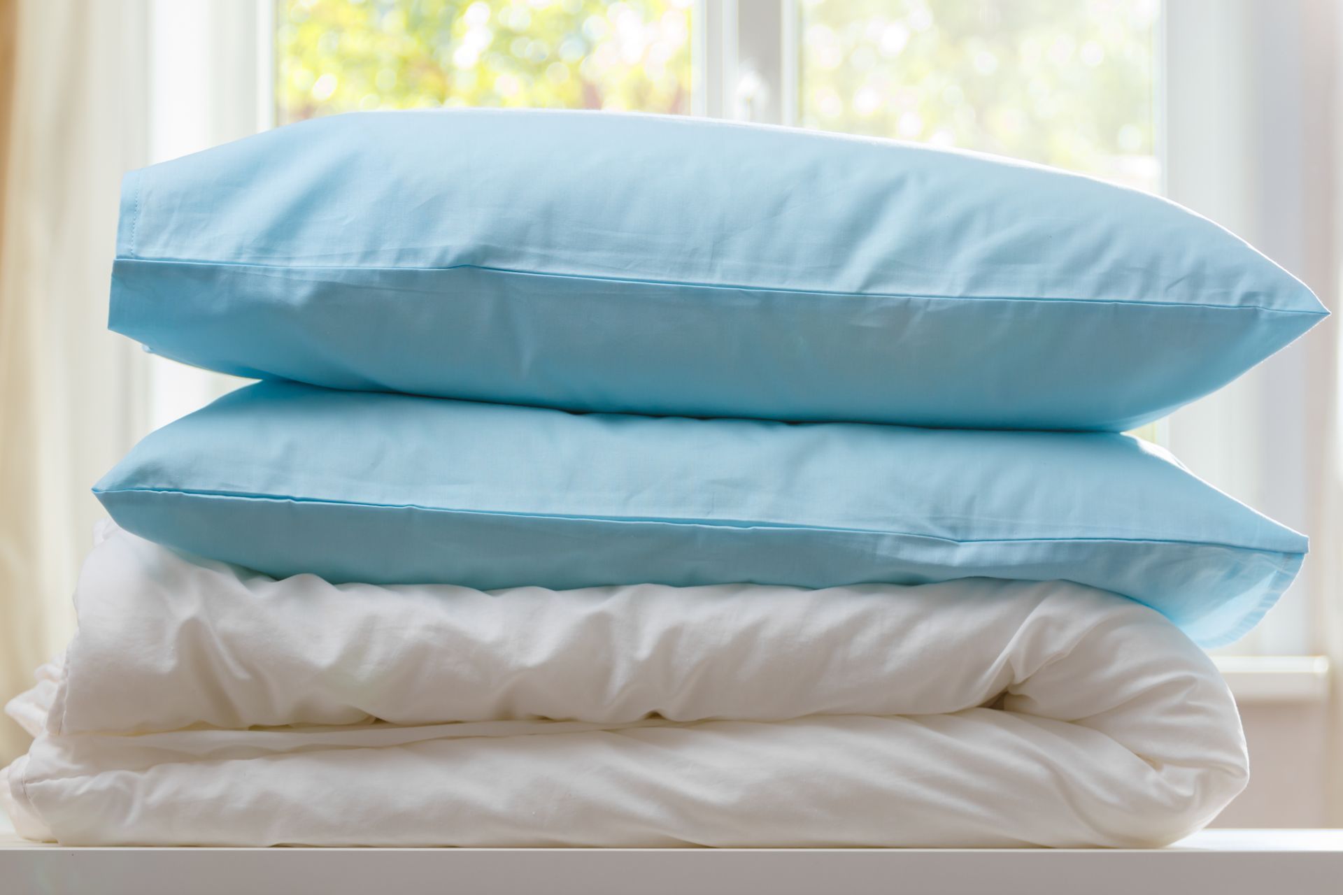 Couette et oreillers propres