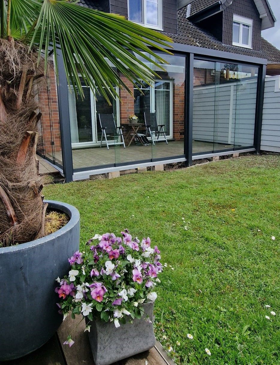 Wintergarten aus Glas mit flexiblen Elementen