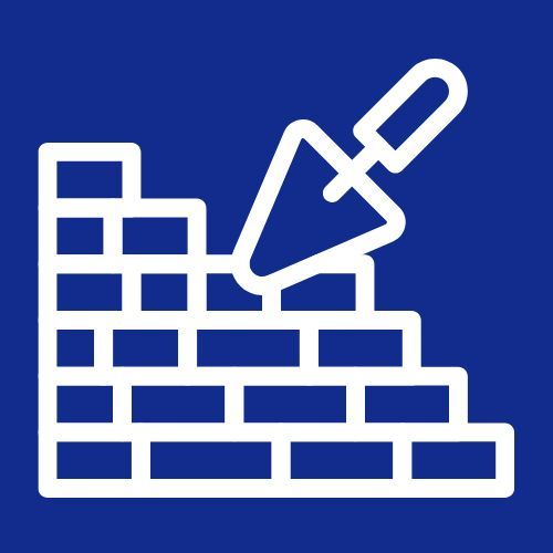 Se está utilizando una paleta para construir una pared de ladrillos.