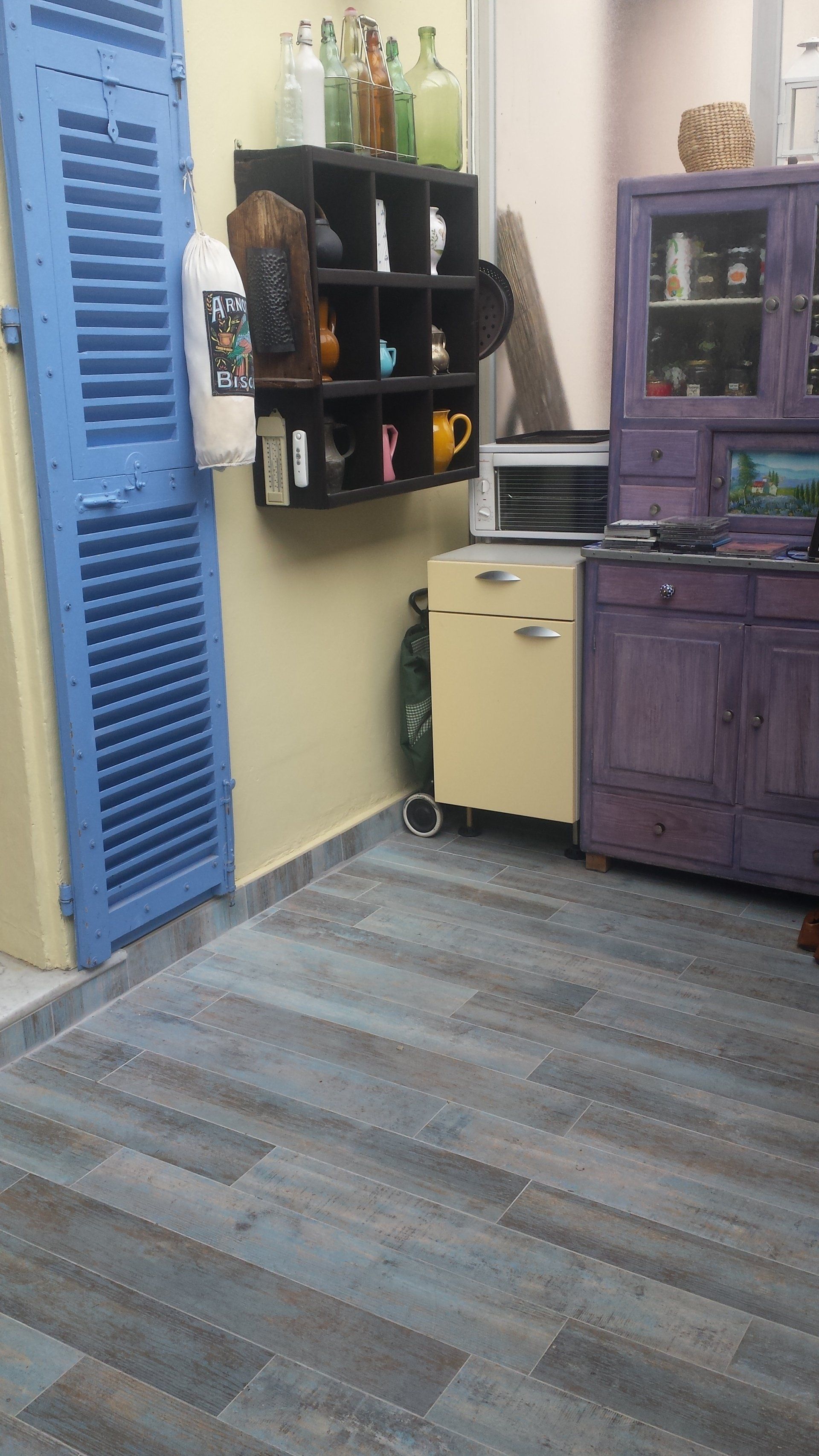 Véranda carrelage imitation parquet