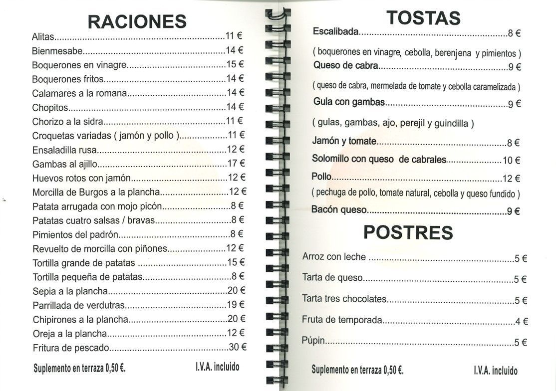 Un libro encuadernado en espiral está abierto en una página que dice postres.
