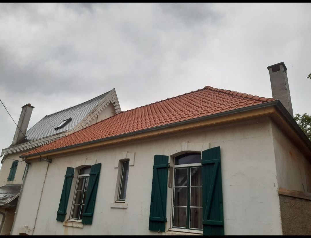 Charmante maison avec une toiture rénovée