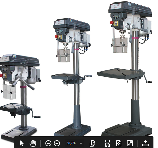 Trois perceuses à colonne de différentes tailles, grises et argentées