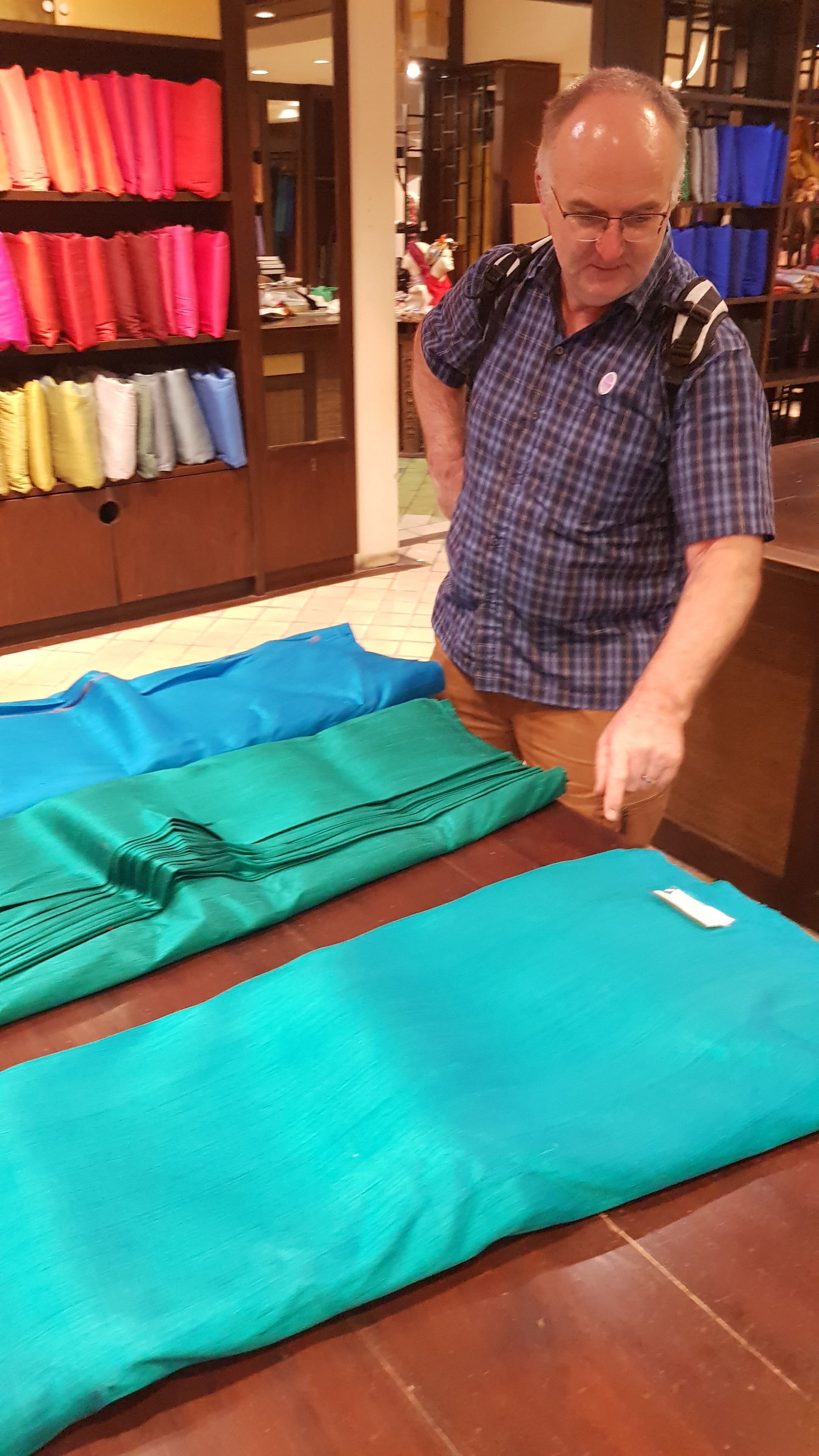 man buying silk