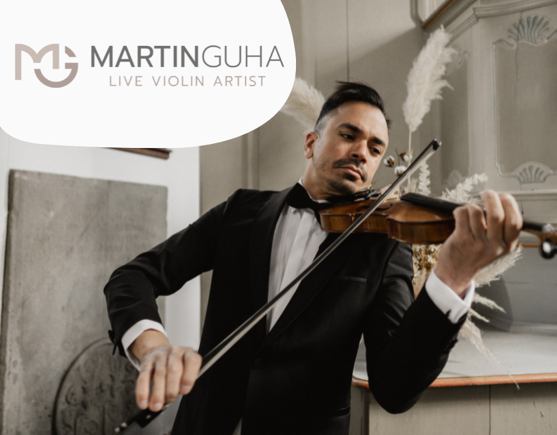 Man in a tuxedo holding a violin