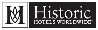 Logo von Historic Hotels Worldwide mit stilisiertem „H“- und „M“-Symbol und Text.