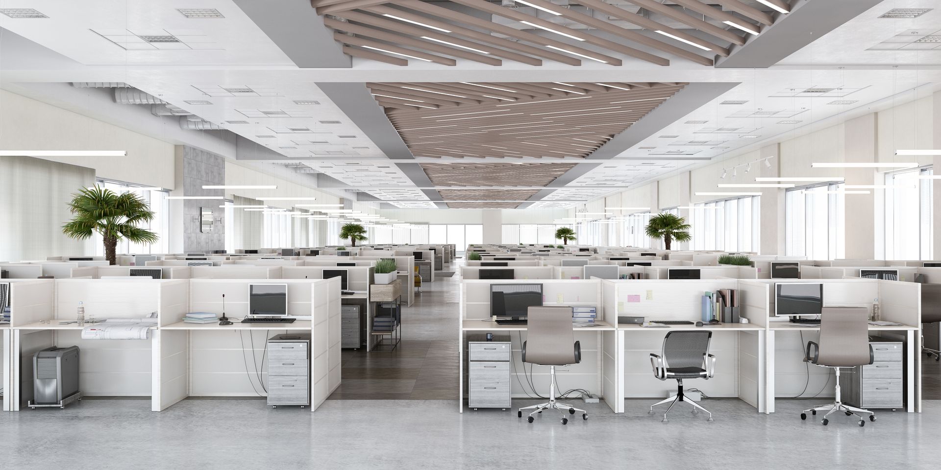 Bureaux de travail dans un open space très grand et illuminé