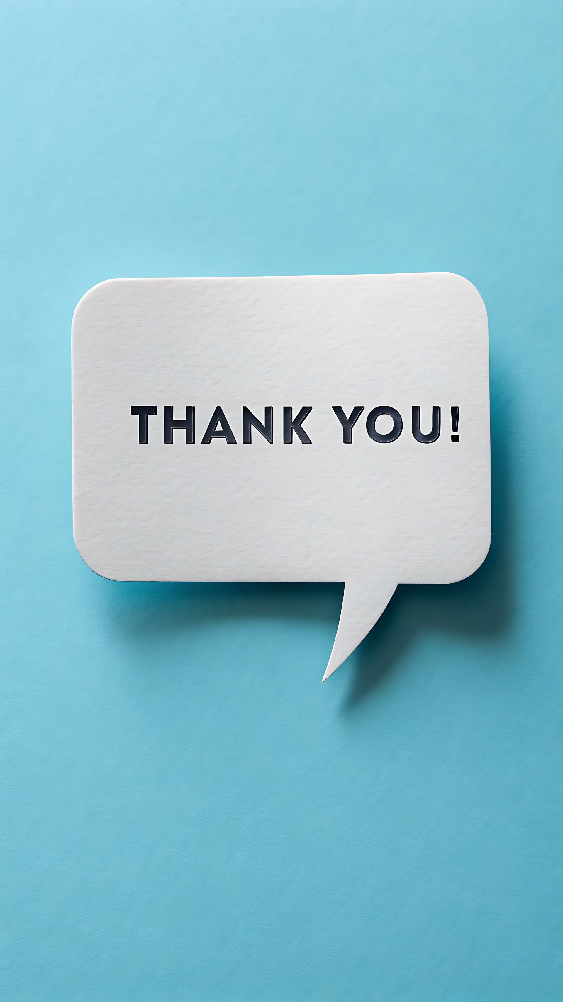 Bulle de dialogue blanche avec le texte MERCI ! en anglais sur fond bleu.