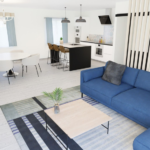 Un salon avec un canapé bleu et une table basse