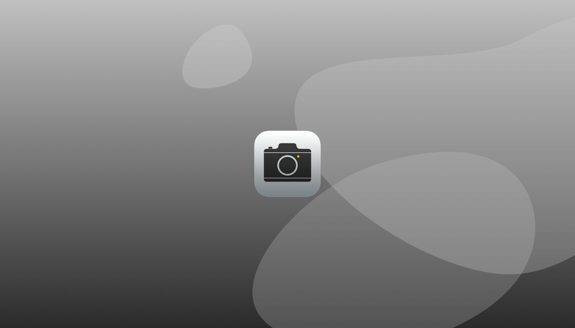 Icône de l'application Appareil photo centrée sur un fond dégradé gris avec des formes subtiles.