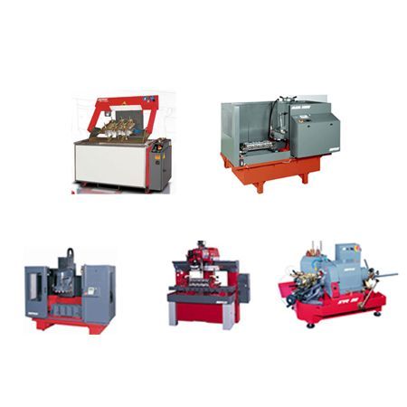 Cinq machines industrielles ; de tailles, formes et couleurs variées.