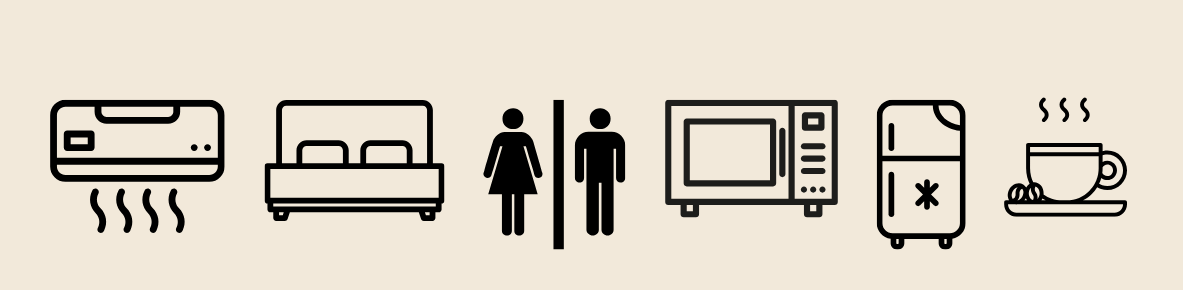 Iconos que representan comodidades: aire acondicionado, cama, baño, microondas, refrigerador, café.