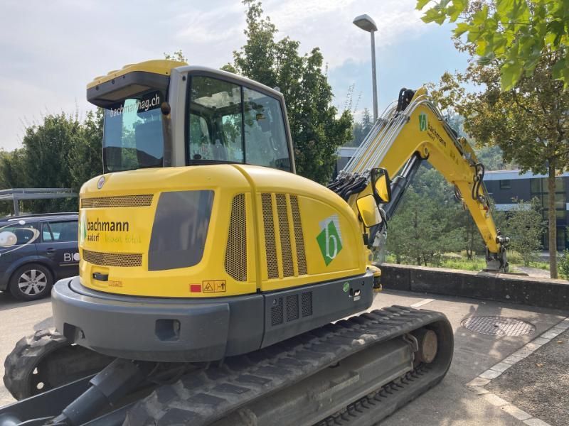 Bagger mit Logo, Foto von Anschrift.ch Schöb
