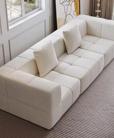 Uma sala de estar moderna e minimalista com móveis pretos