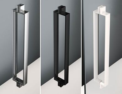 Tres manijas de puerta rectangulares: cromadas, negras y blancas.