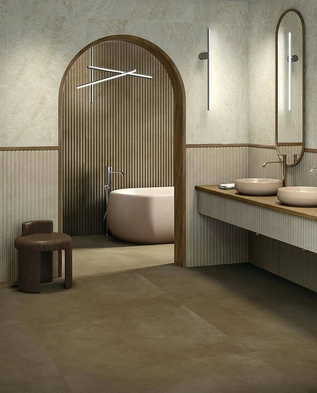 Baño moderno con bañera, dos lavabos y detalles en madera. Tonos beige y marrón.