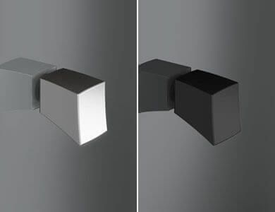 Dos imágenes: un bloque angular blanco y otro negro proyectan una sombra sobre una superficie gris, representando la luz y la sombra.