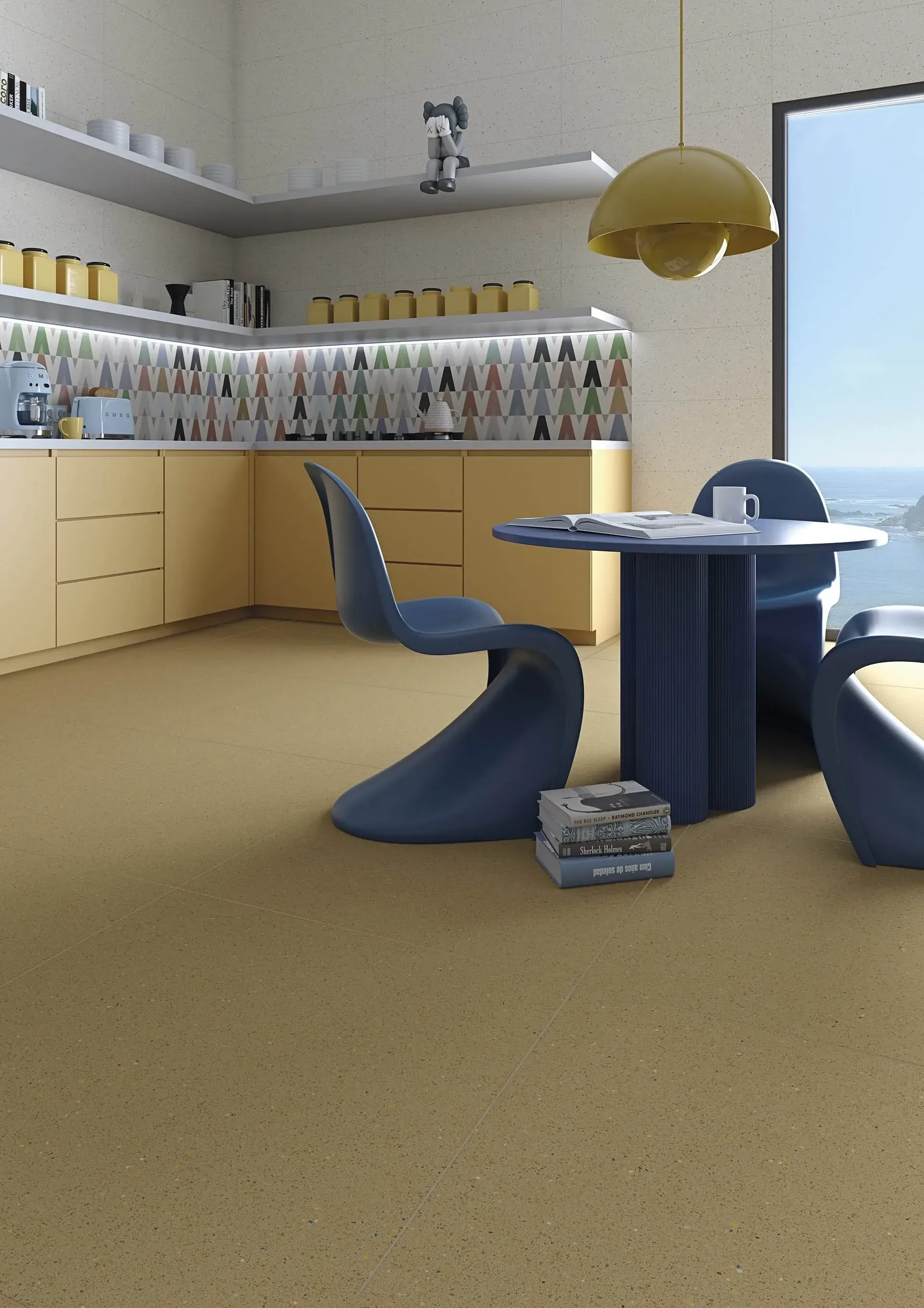 Cocina con gabinetes amarillos, mesa y sillas azules, vista al mar.