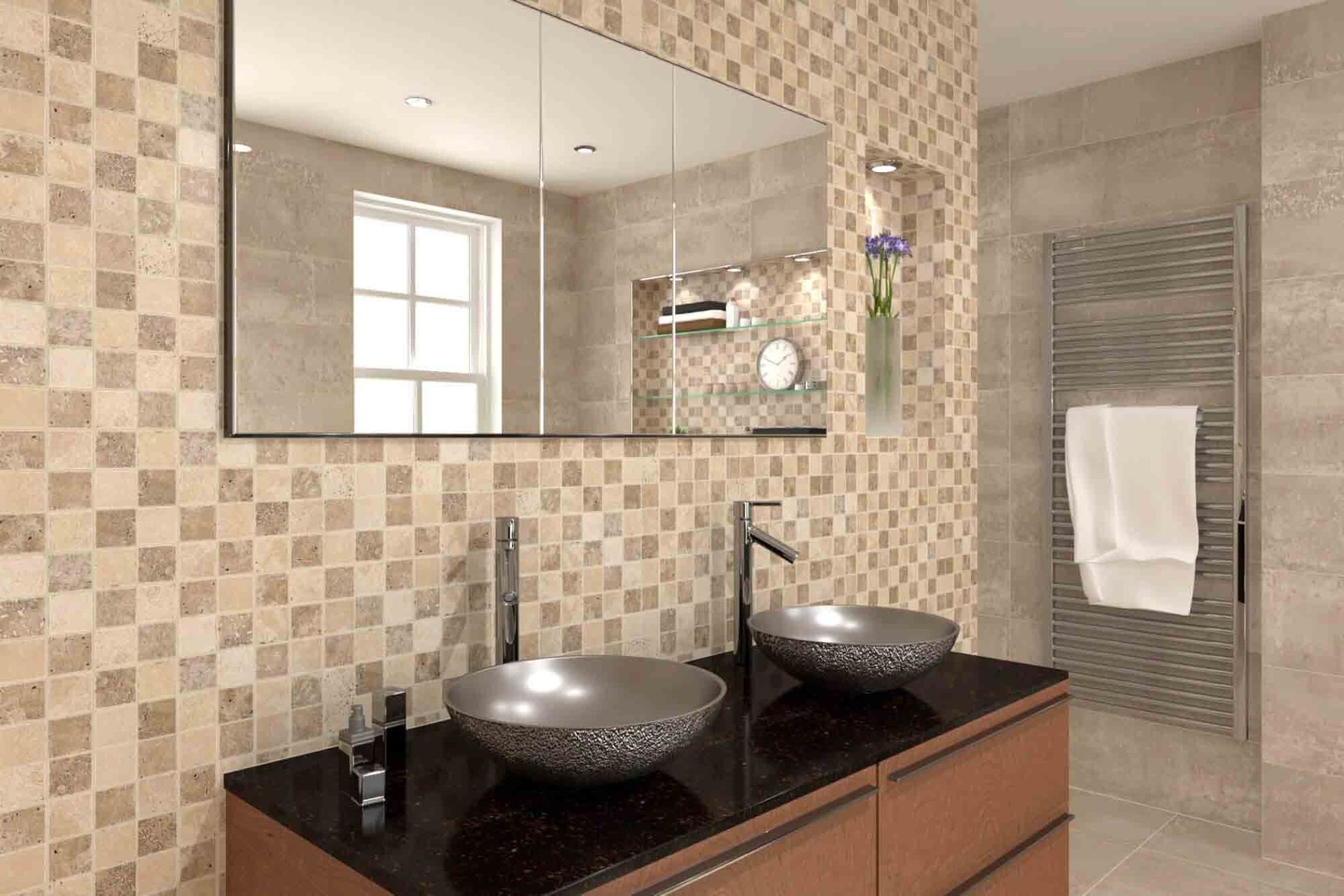 Baño con paredes de azulejos cuadrados, encimera oscura, lavabos dobles plateados y un espejo grande.