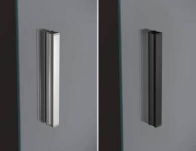 Manija de puerta de ducha dorada sobre panel de vidrio, dentro de una ducha.