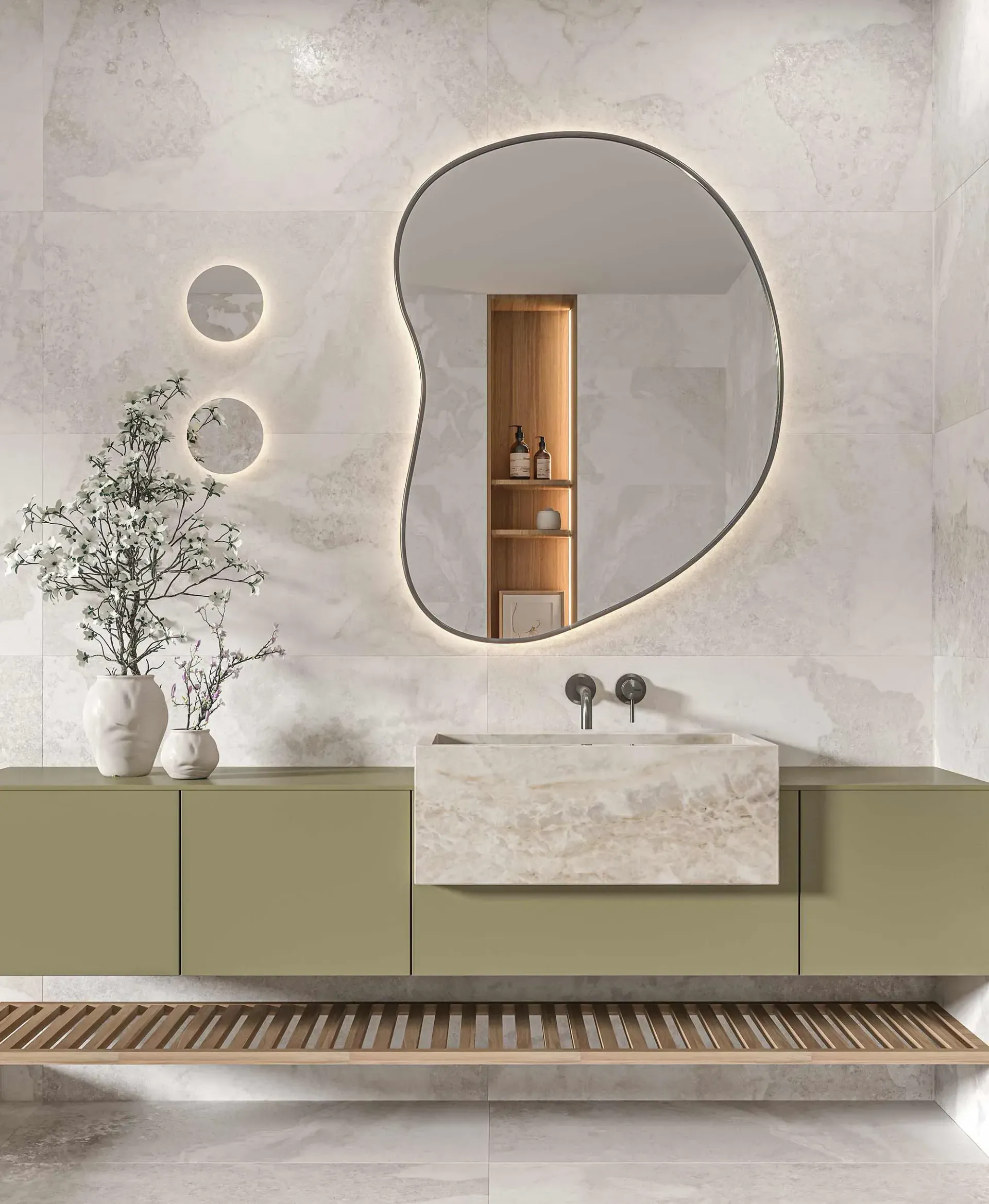 Baño moderno con un espejo único, un mueble verde salvia y un lavabo de piedra.