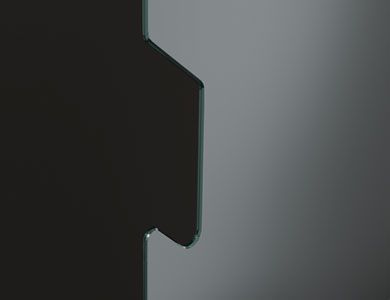 Forma oscura con un borde afilado sobre un fondo degradado gris.