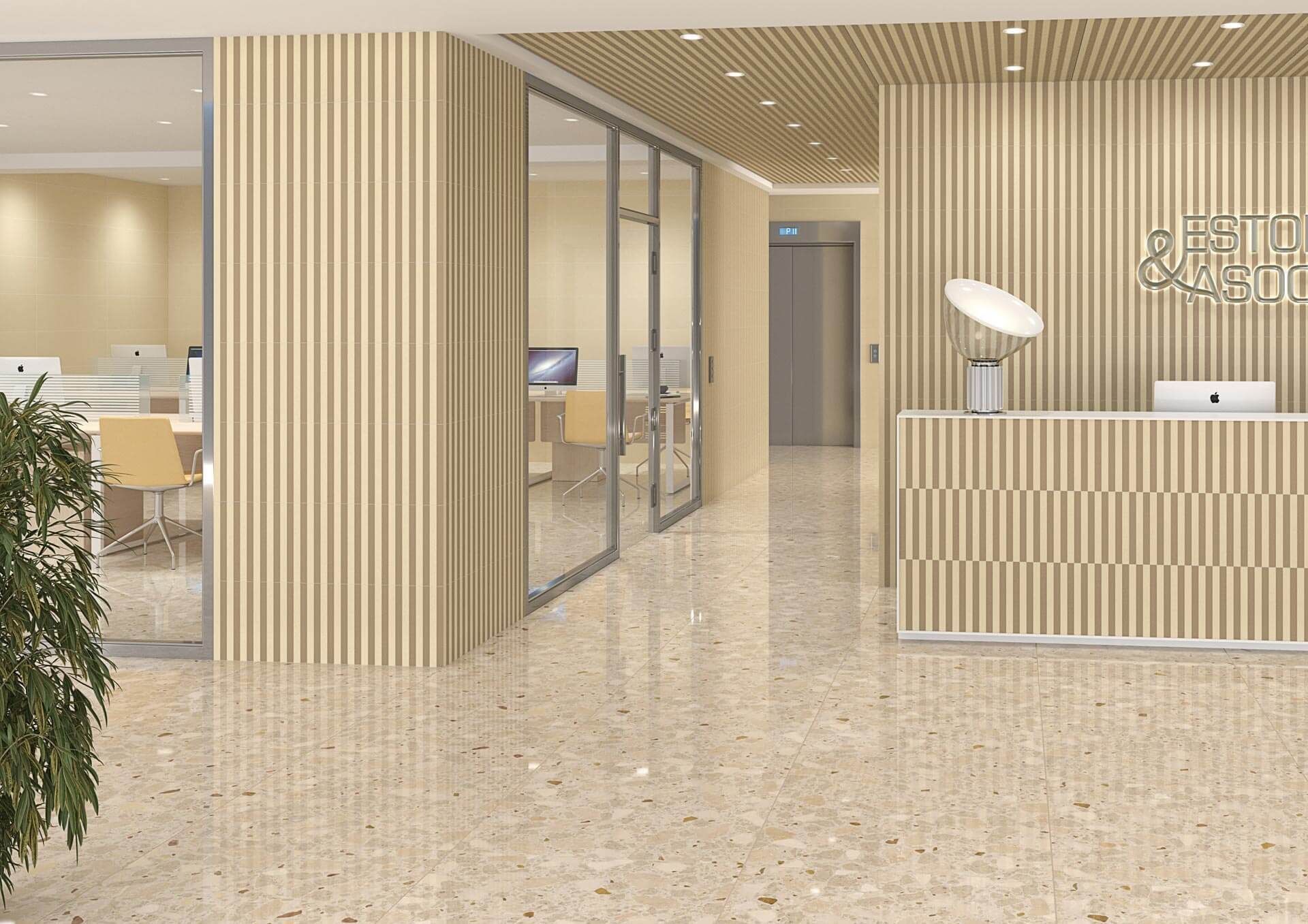 Interior de oficina con mostrador de recepción, oficinas con paredes de vidrio y piso moteado, en tonos neutros.