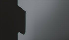 Una forma oscura y angular sobre un fondo degradado gris.