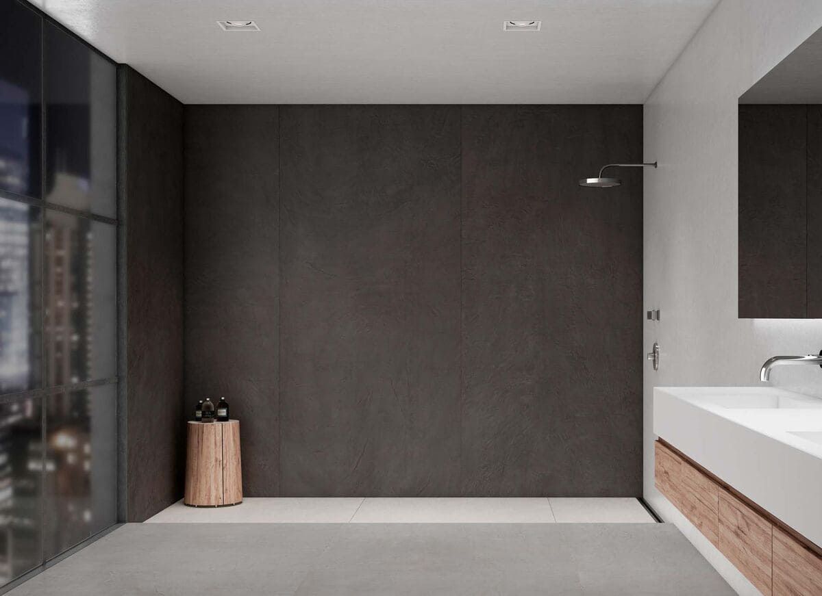 Baño moderno con paredes grises, ducha de cristal, base de lavabo de madera y vista a la ciudad.