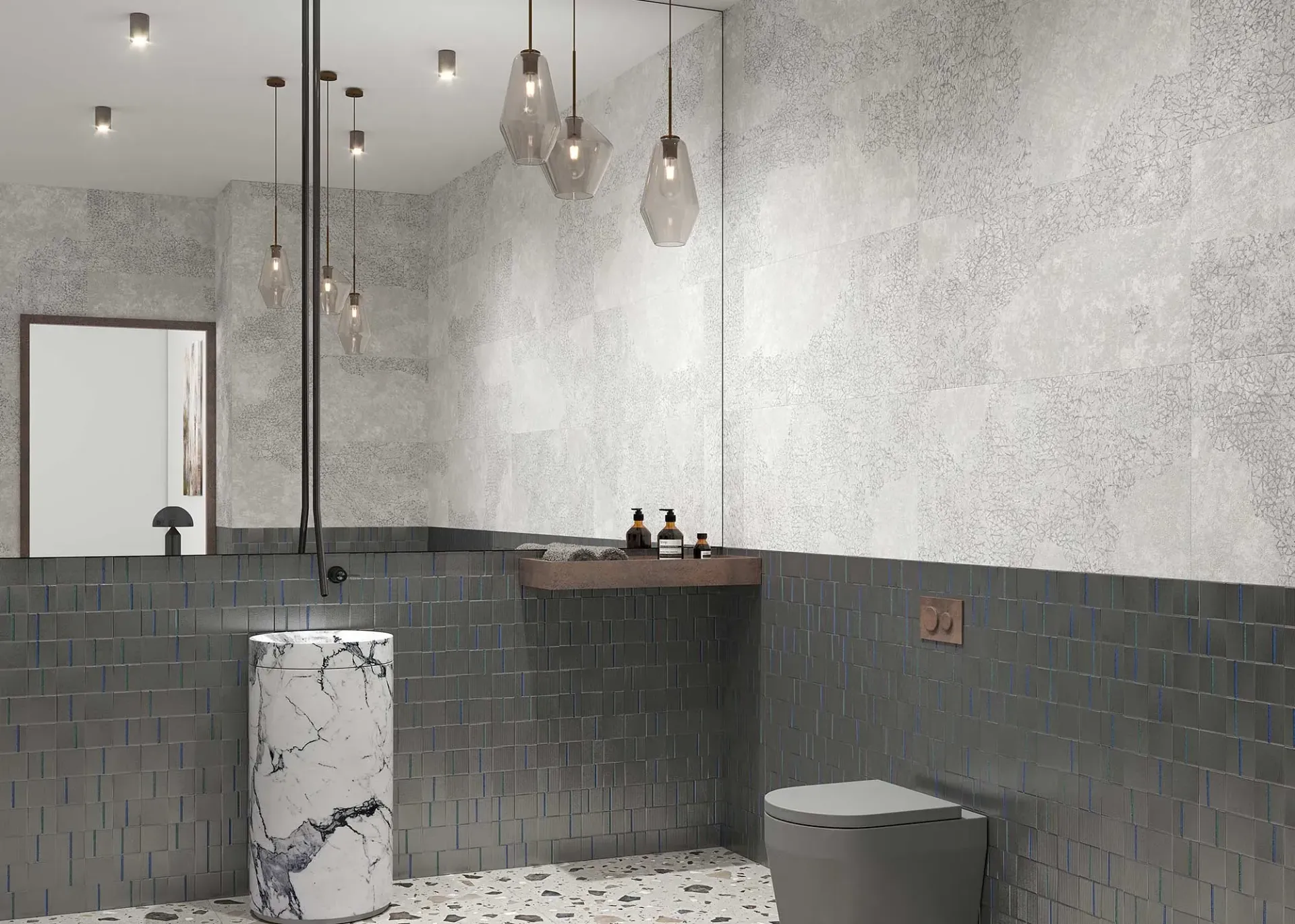 Baño moderno con paredes texturizadas en gris y blanco, lavabo de mármol y lámparas colgantes.