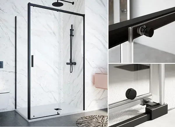 Mampara de ducha de cristal con marco negro y herrajes negros en un baño.