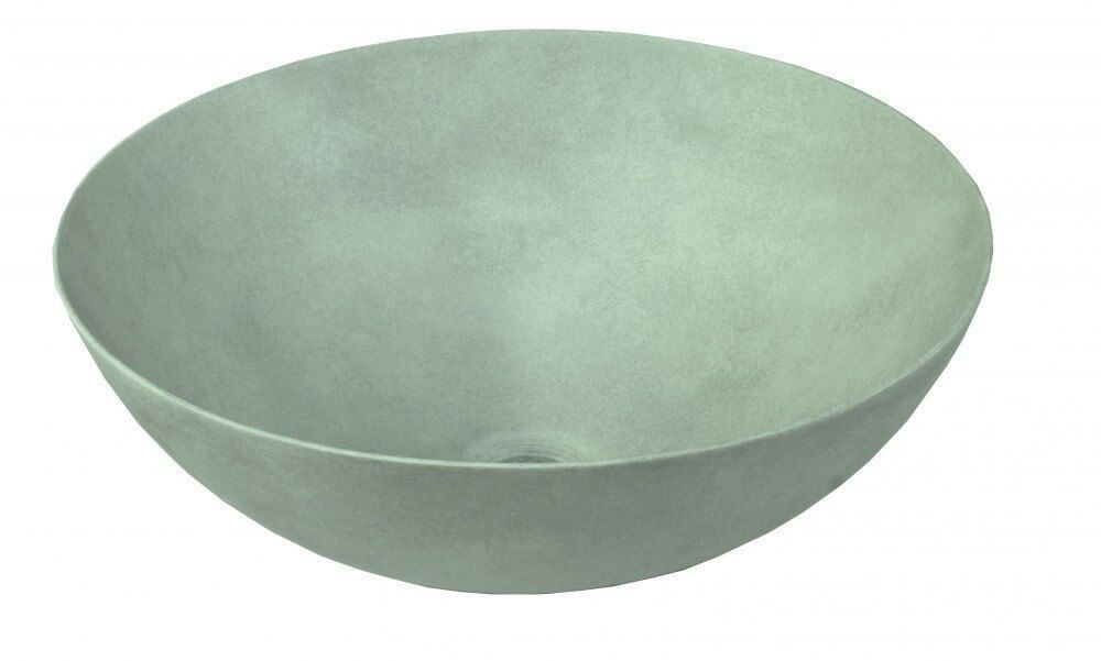 Recipiente de hormigón redondeado, probablemente un lavabo de baño. Color gris claro.