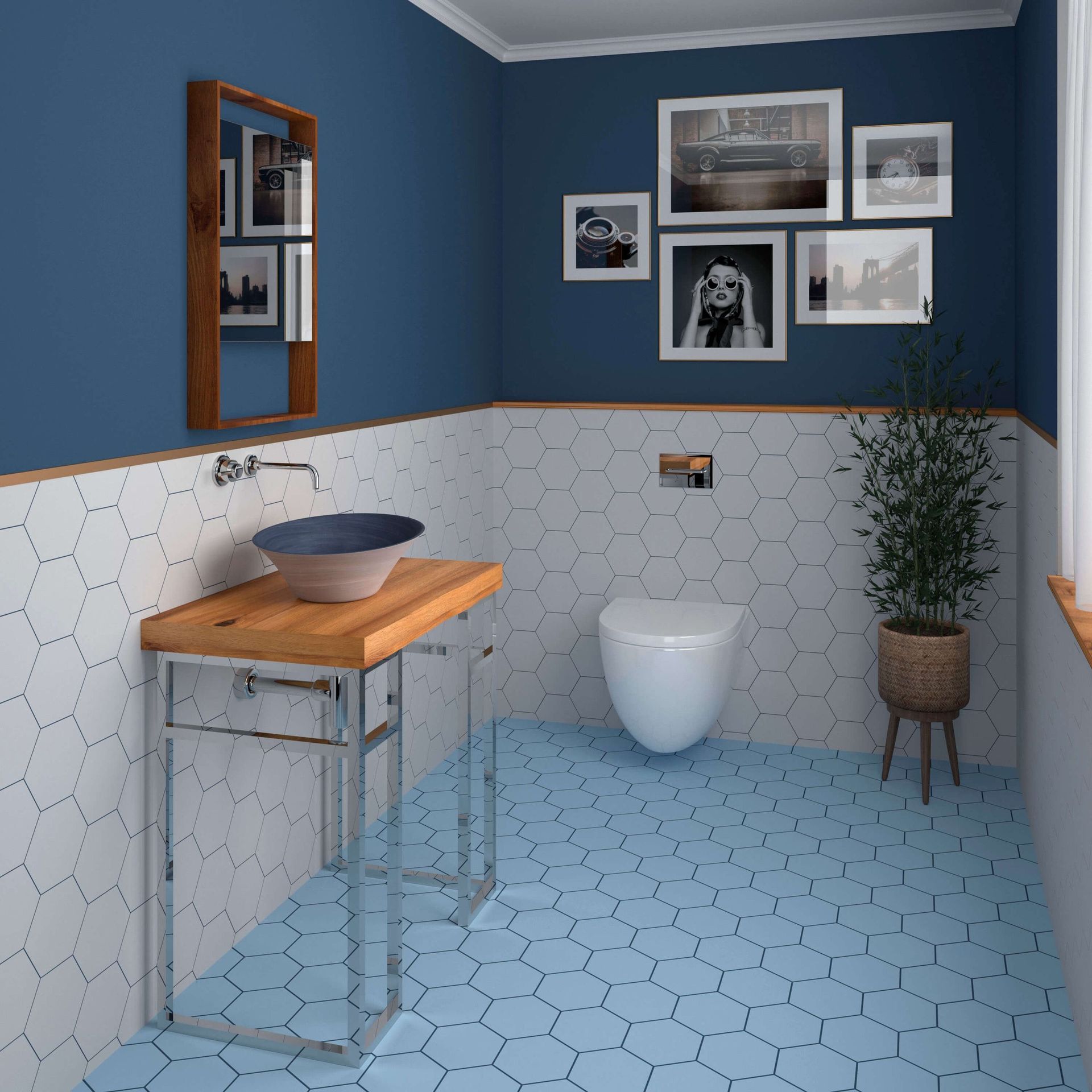 Baño azul con azulejos de nido de abeja blancos, lavabo de madera y fotografías enmarcadas.