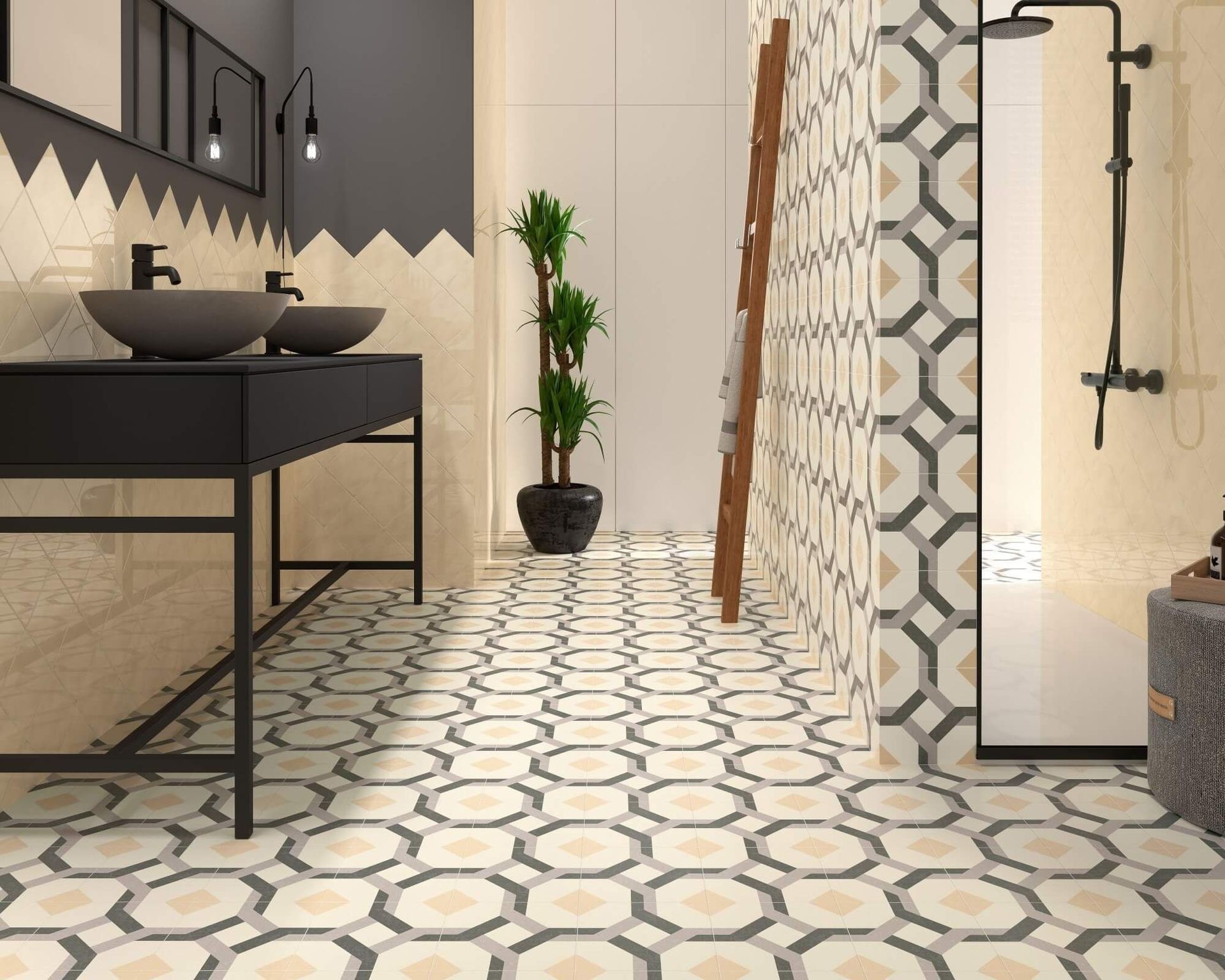 Baño con piso de baldosas estampadas, tocador oscuro y pared con acento geométrico.